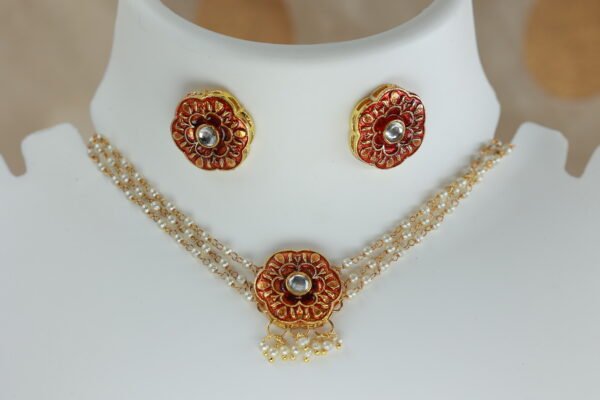 Elegance Redefined: Red Meenakari Kundan Choker with Pearl Chain