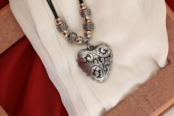 Elegant Long Black Cord Necklace with Heart Pendant