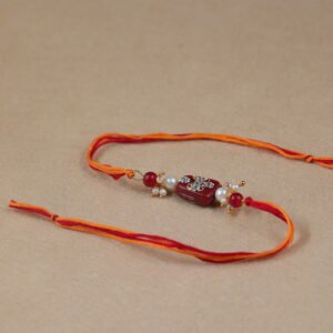Simple Maroon Tumble Meenakari Bead Rakhi
