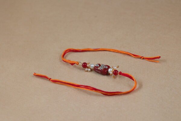 Simple Maroon Tumble Meenakari Bead Rakhi